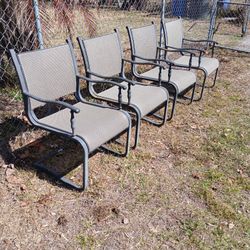 FOUR NICE MATCHING METAL PATIO CHAIRS 