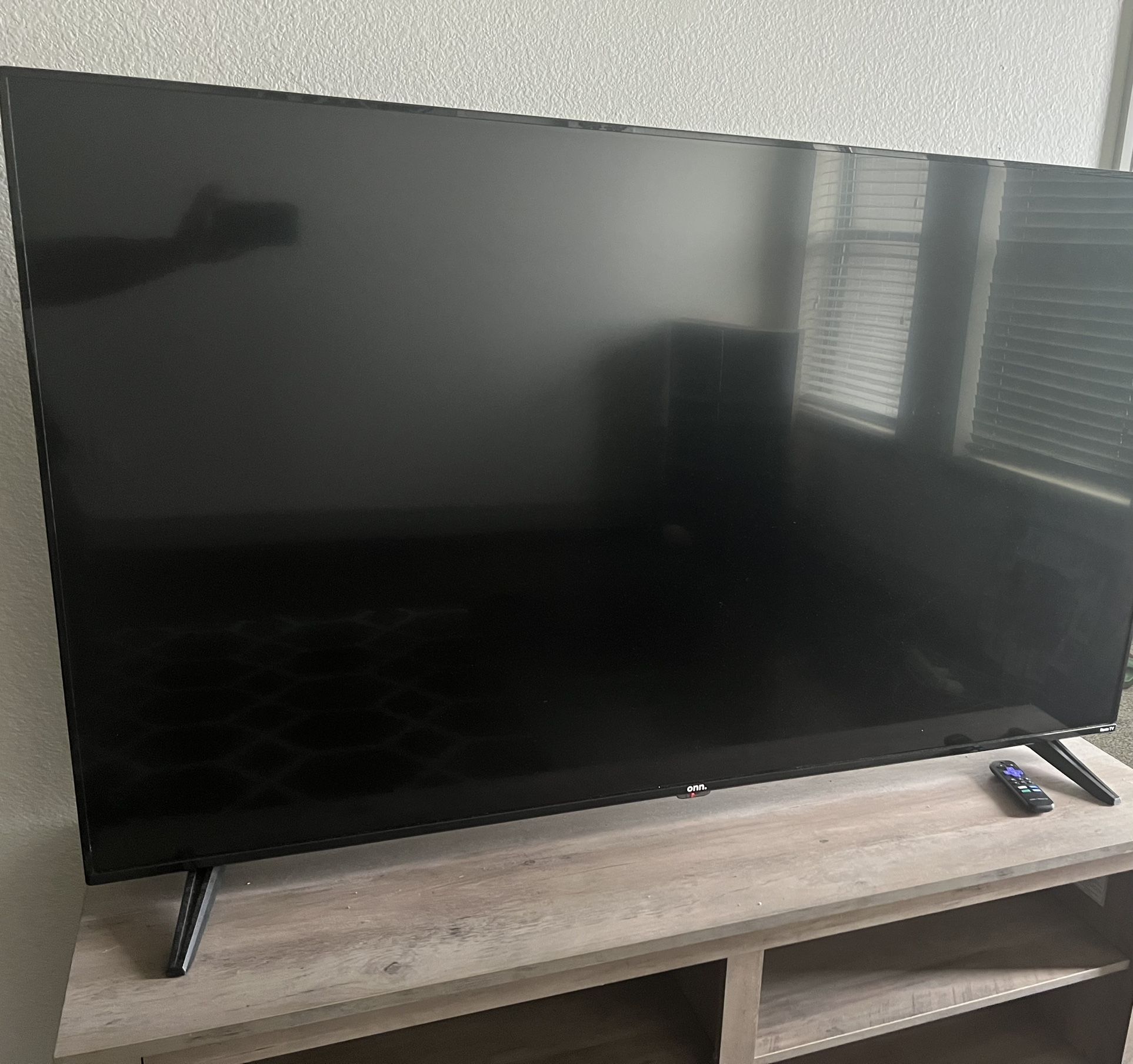 65 inch ONN ROKU SMART TV & TV stand