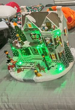 Animated Disney Christmas House 12”H Moments In Time LED Lighted Holiday Village with Music Volume Control Hand-Painted Disney Characters Power Adapte