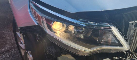 2016 Kia Optima front passenger headlight