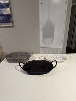 3 wicker baskets with handles -never used
