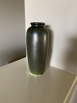 Green ceramic vase.