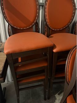 Orange Leather Dining Chairs with Nailhead Trim