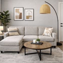 Modern living room set- sectional reverse chaise, chair and table. Must go.  