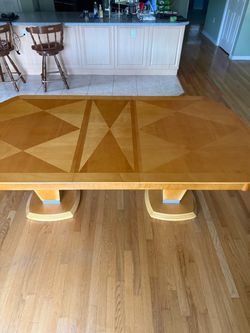 Dining Table with 2 Extension Leafs and hutch/china cabinet with light.