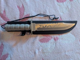 Holyedge heavy-duty fixed blade knife with a silver-colored aluminum handle.