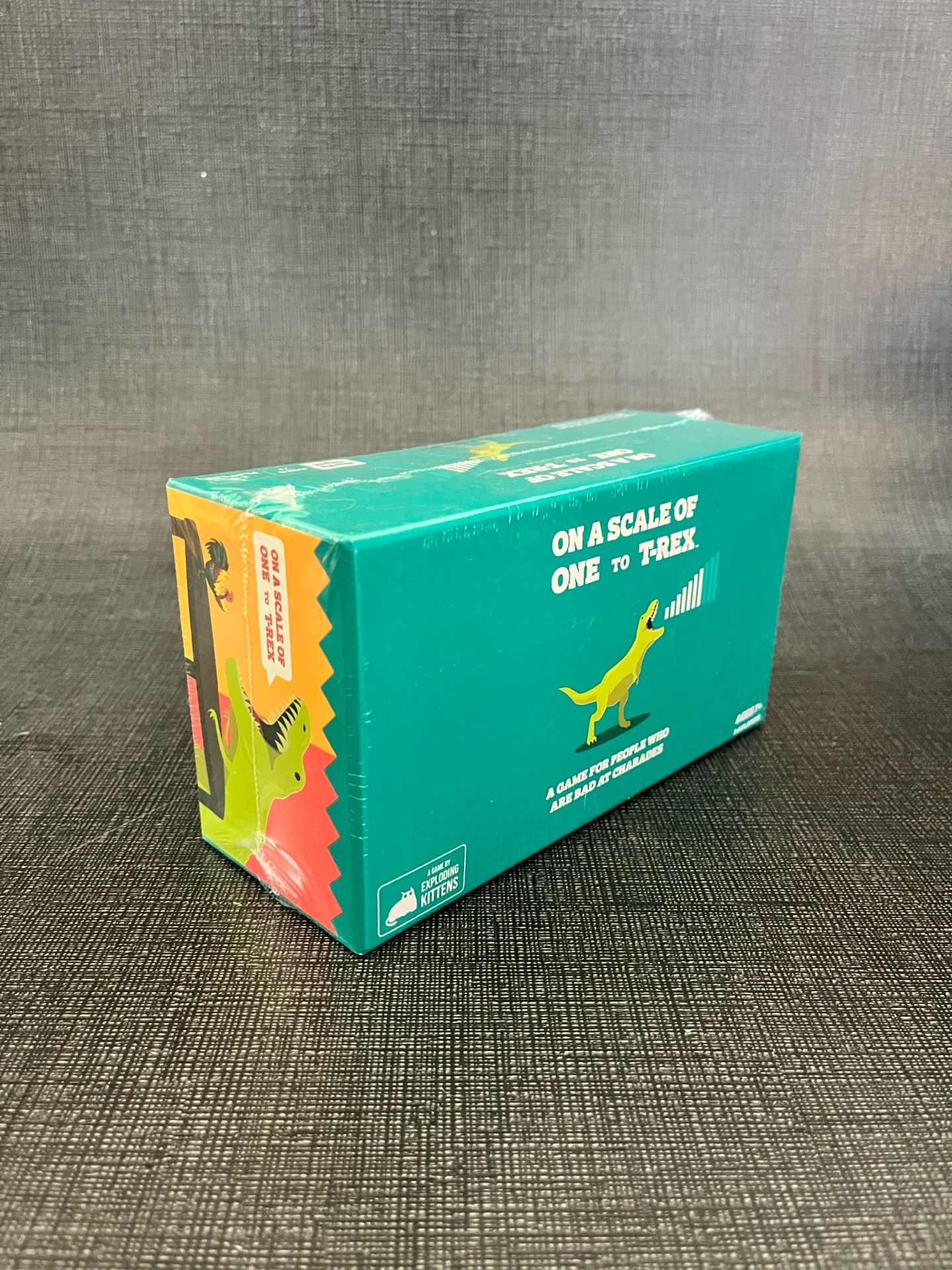 On a Scale of One to T-Rex: Party Charades Card Game for 2-8 Players