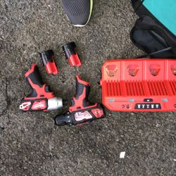 Brand New Milwaukee Impact /drill Combo Set With 4  Battery charger Bank  