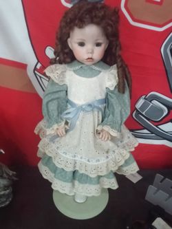 Porcelain hand painted doll
