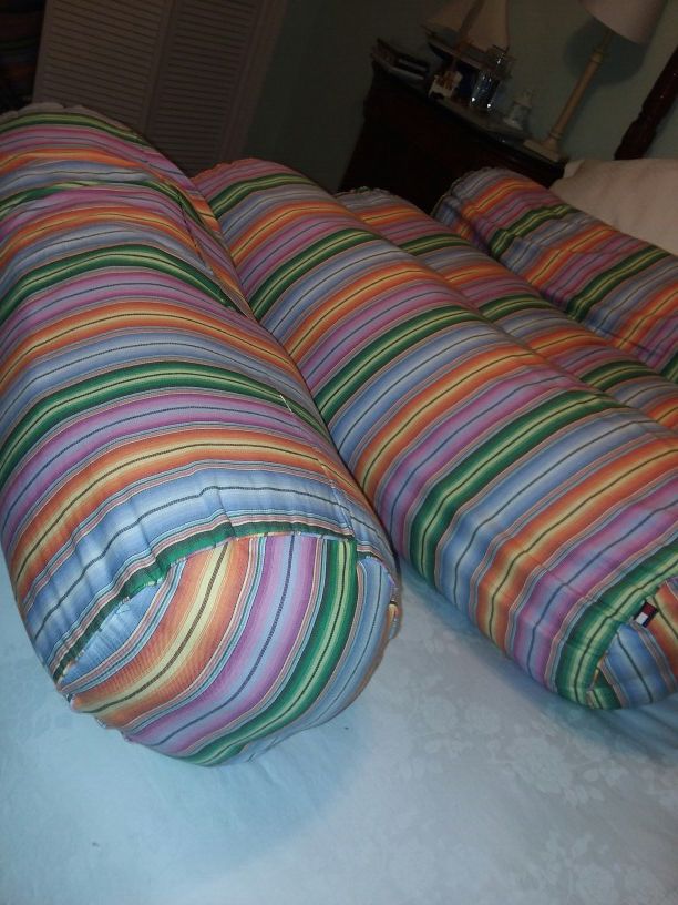 One tommy hilfiger round body pillow