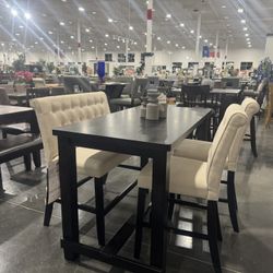 4 Piece Dining room set / Includes: Table , 2 Chairs and bench . 