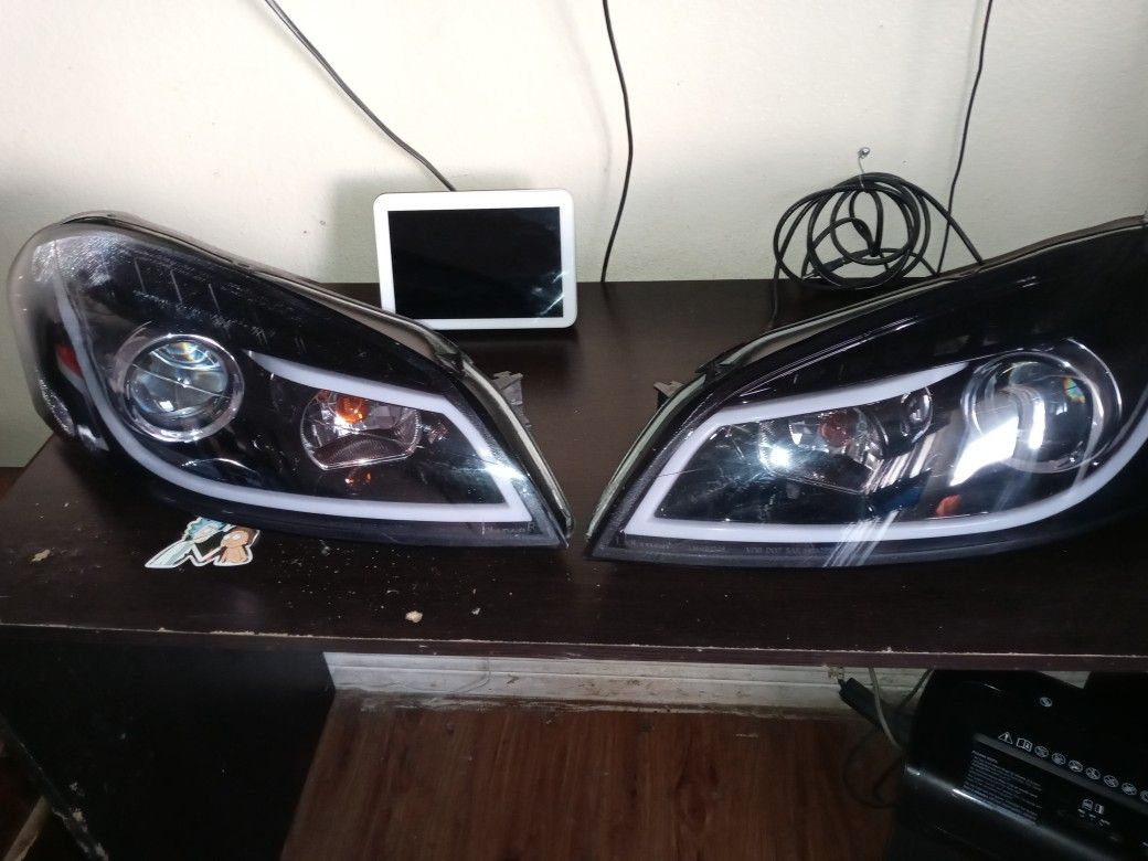 Headlights 06-12 Impala 