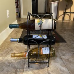 Small Wine Rack with 3 Tiers.  Antiqued Finish, Metal with Carry Handle. 