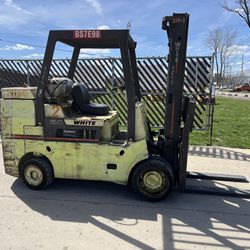 FOR SALE A WHITE MA150 FORKLIFT.94/ 114 MAST,AUTO TRANS,P/S. 15,000LB LIFT CAPACITY.
