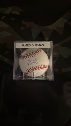 James outman signed ball from 2024