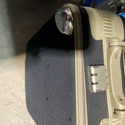 Navy blue carryon suitcase