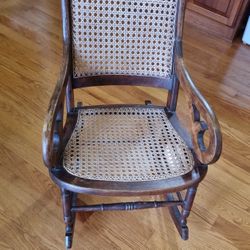 Vintage Lincoln Cane Rocking Chair
