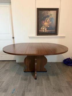 Oval Walnut Pedestal Dining Table