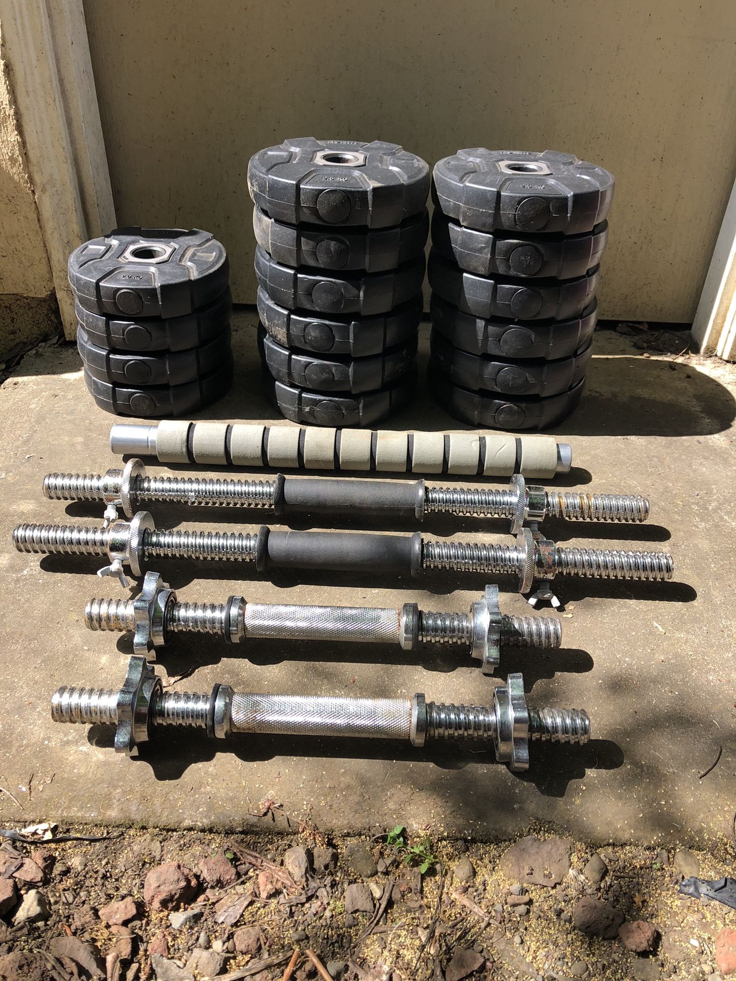 Adjustable Dumbbell Weight set with Bars and Plates.