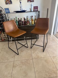 Barstools veinte cada uno
