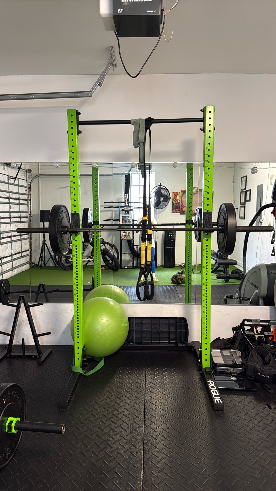 Rogue Squat Rack With Barbel And Weights