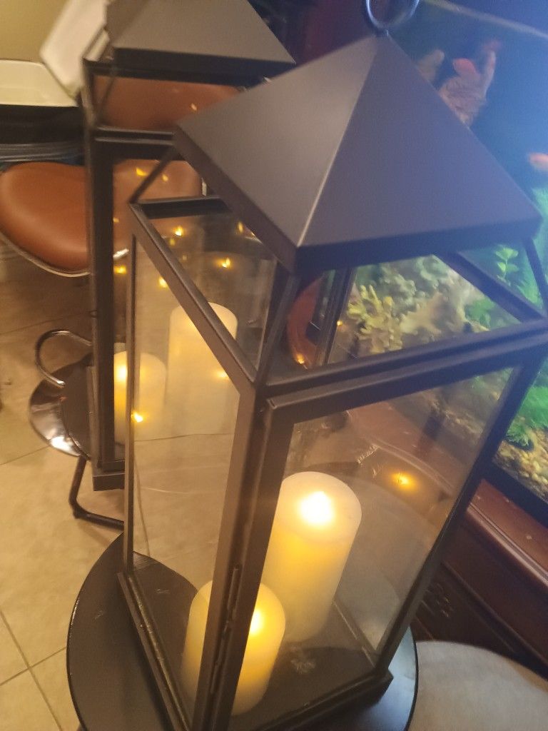 2 Lanterns WIth Battery Operated Candles And Metal Stands