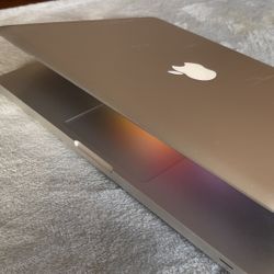Apple Macbook Pro 13 Inches Core 2 Duo, 4GB Ram, 320GB Storage $175