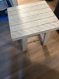 square farmhouse-style dining table