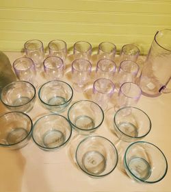 12 cups, 8 bowls and 2 pitchers