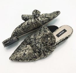 DKNY Pier Mules….Sz: 7…Color: Blk/Gold