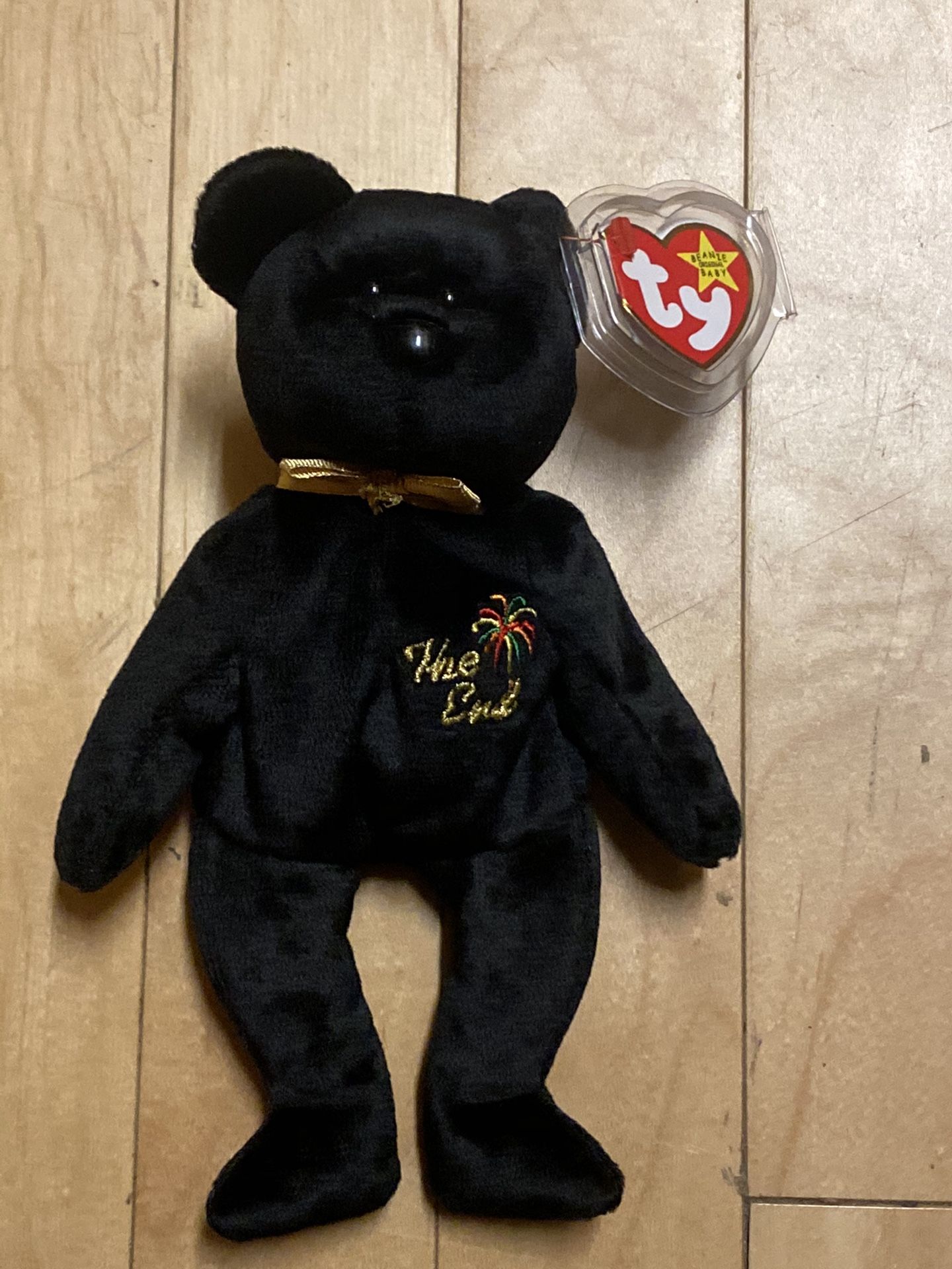 TY Beanie Baby “The End” 1999 Black Bear with tags mint retired.