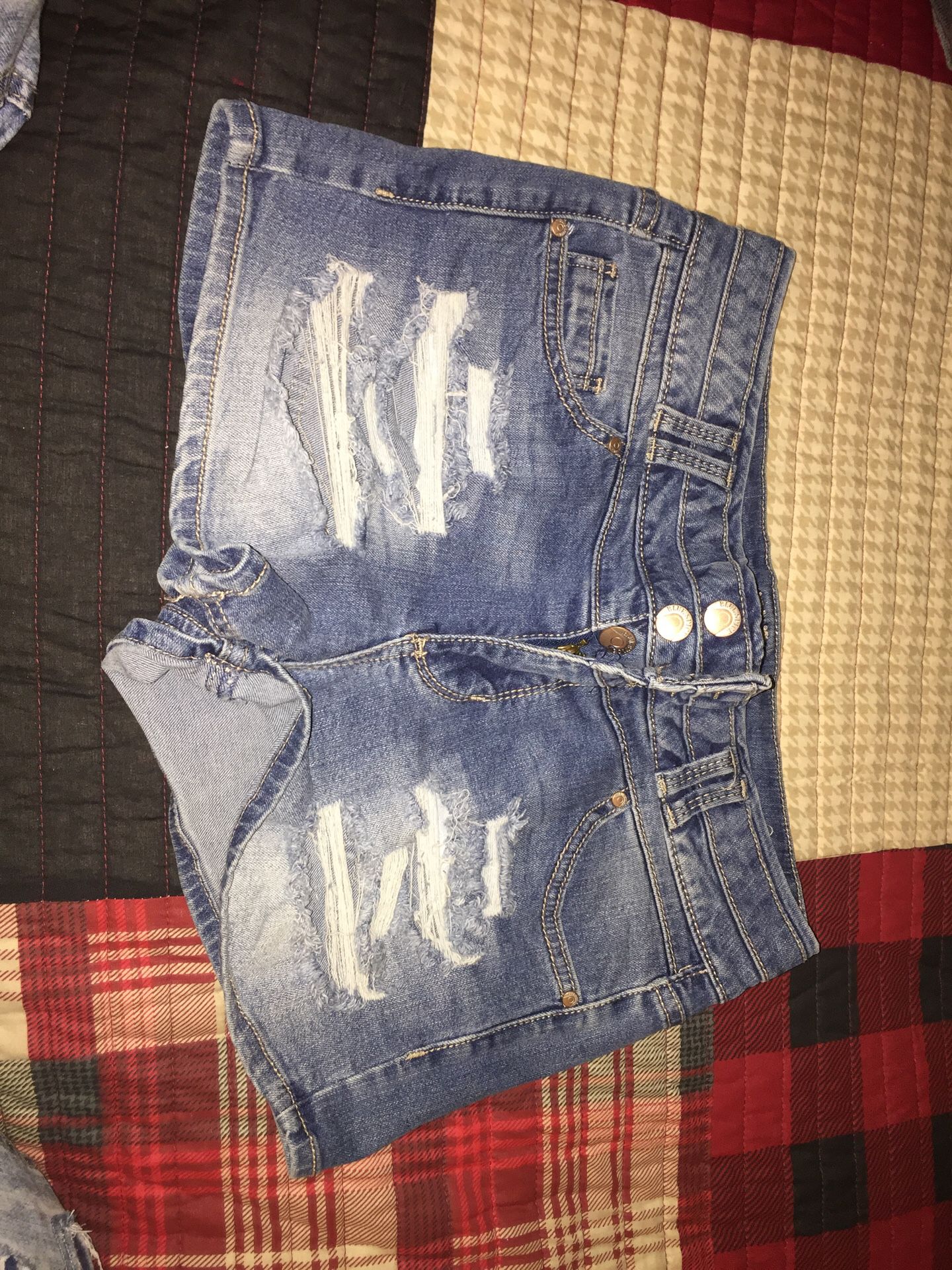 Woman distressed jeans shorts