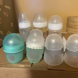 7 Assorted Baby Bottles 4 And 5 oz