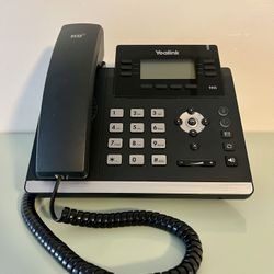 Yealink SIP-T42S professional VoIP office phone.