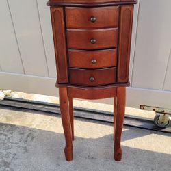 beautiful walnut jewelry armoire ( H:33"W:11.5"D:7")
