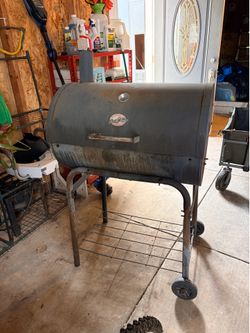 Well used charcoal smoker