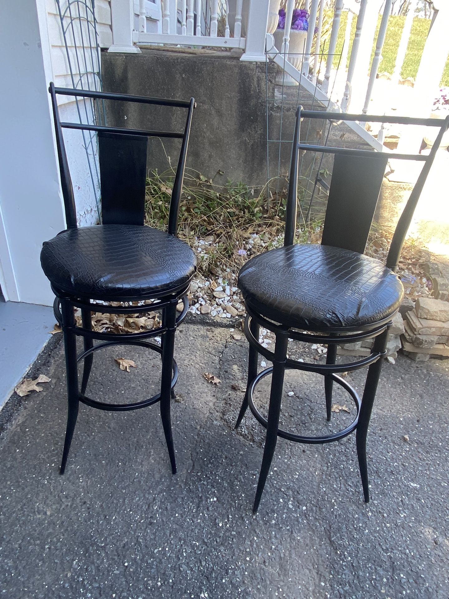 2- Leather Swivel Stools 45”tall 30”seat Height -$30