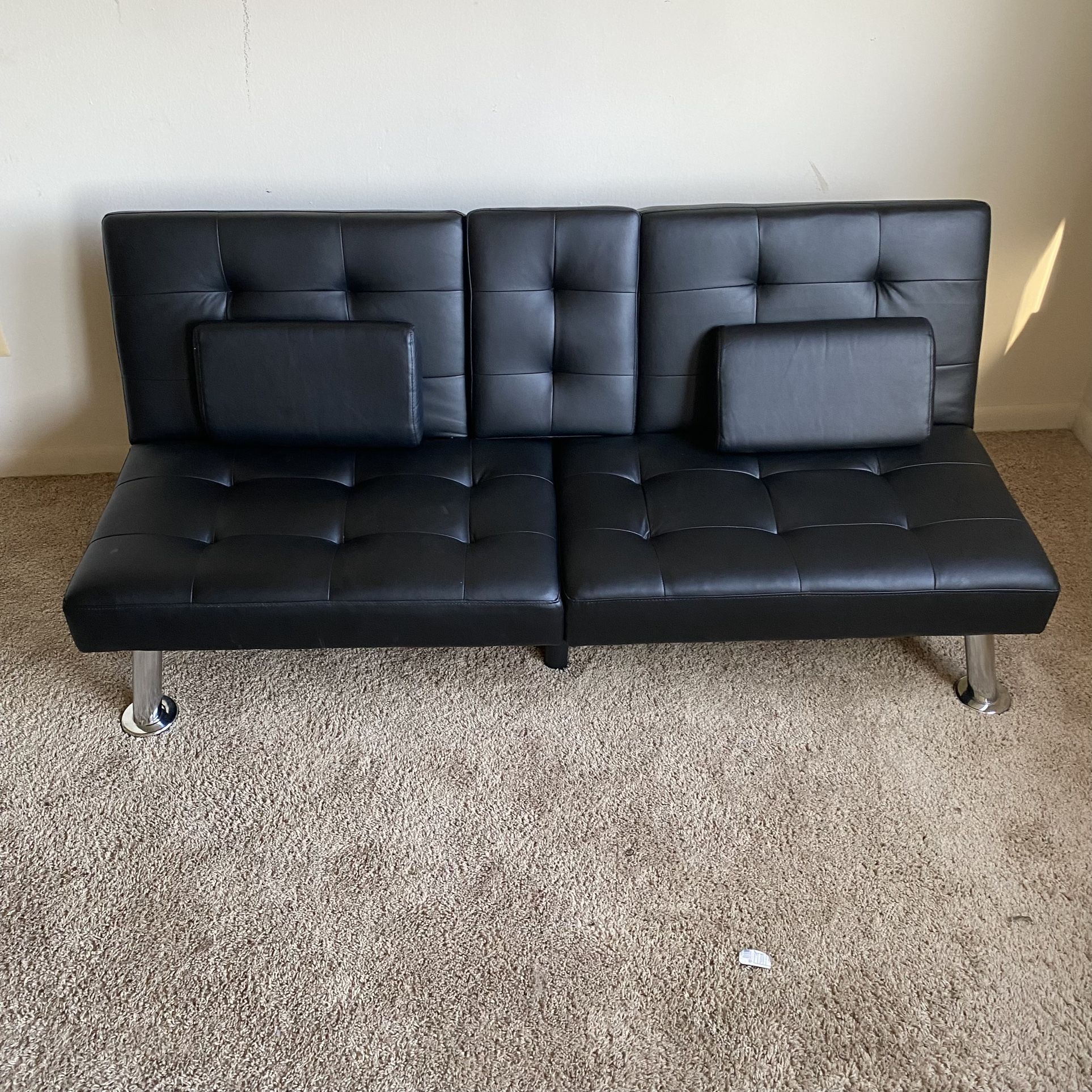 Faux Black Leather Reclining Sofa & Futon Bed. Convertible Recliner Lounge with Silver Metal Legs  Like New pre-owned condition.   Measurements:  Slee