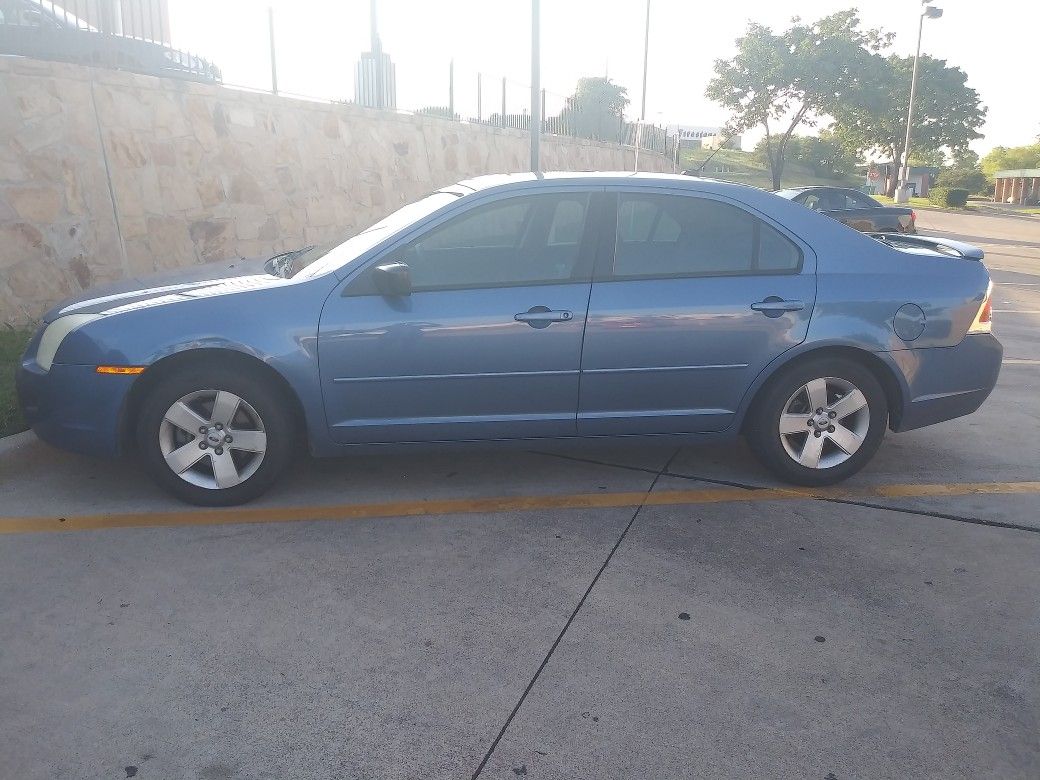 2009 ford fusion with two 12s DB Sub speakers and boss amp