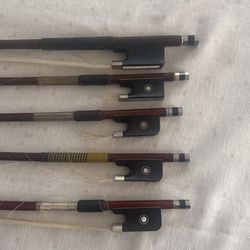 Four Violin Bows And One Cello Bow 