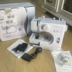 Brand New Sewing Machine In Bags