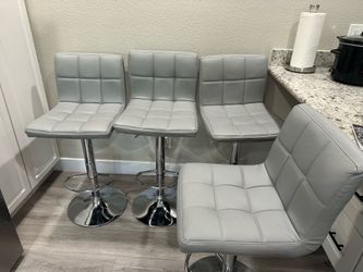 4 light grey swivel counter height adjustable bar stools