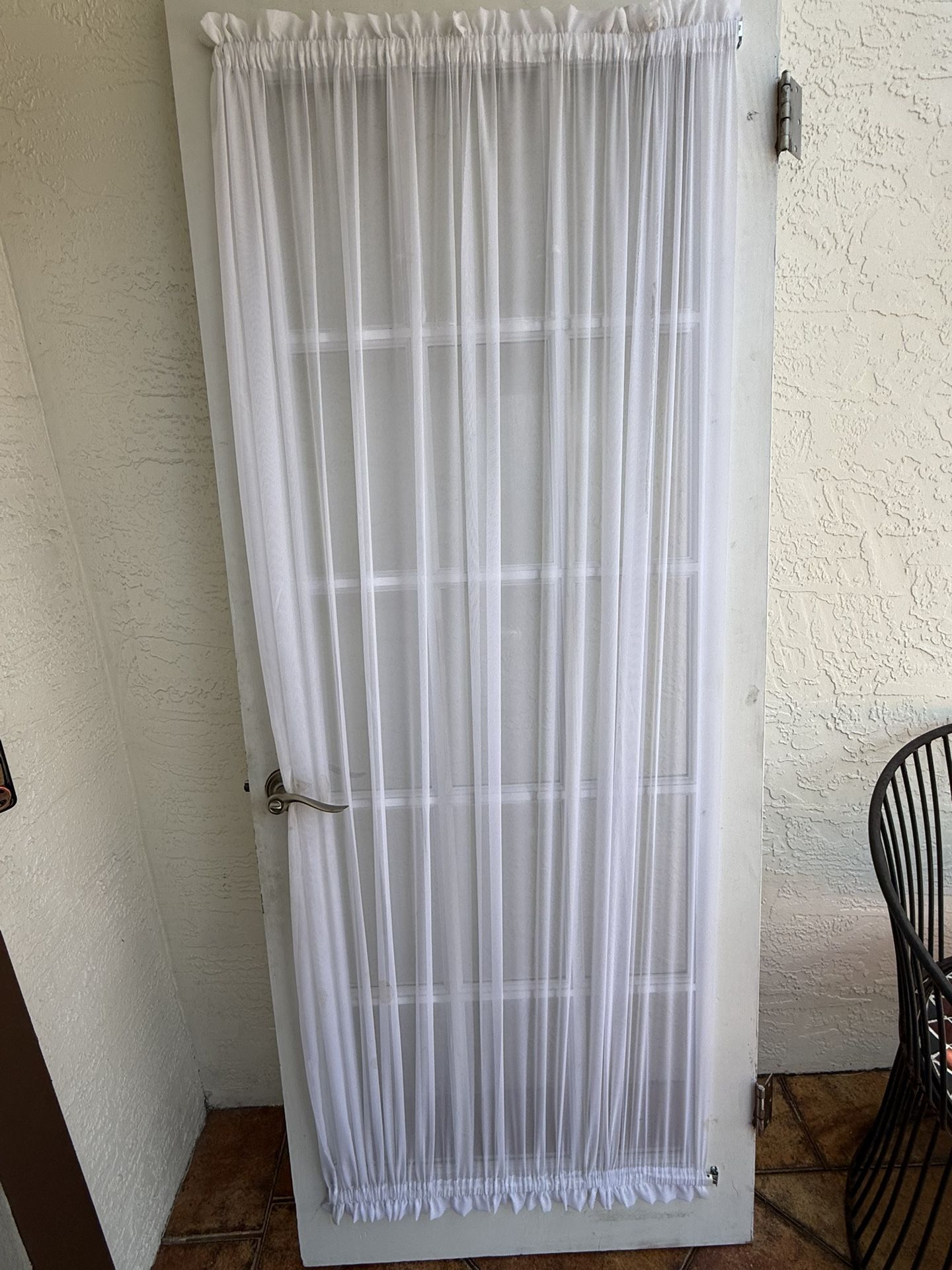 Door to laundry room, closet and TV room.