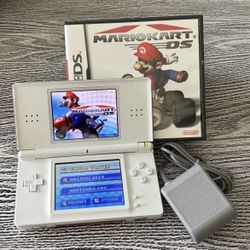 Nintendo DS with Mario Kart game in excellent condition, complete with stylus & charger $60