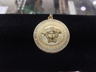 14k Yellow gold and diamond pendant
