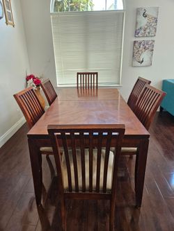 6 seater solid wood dining table