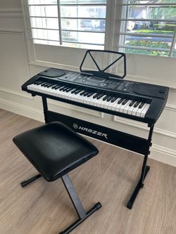 Hamzer 61-Key Electronic Keyboard with Stand. Never used. Perfect condition.
