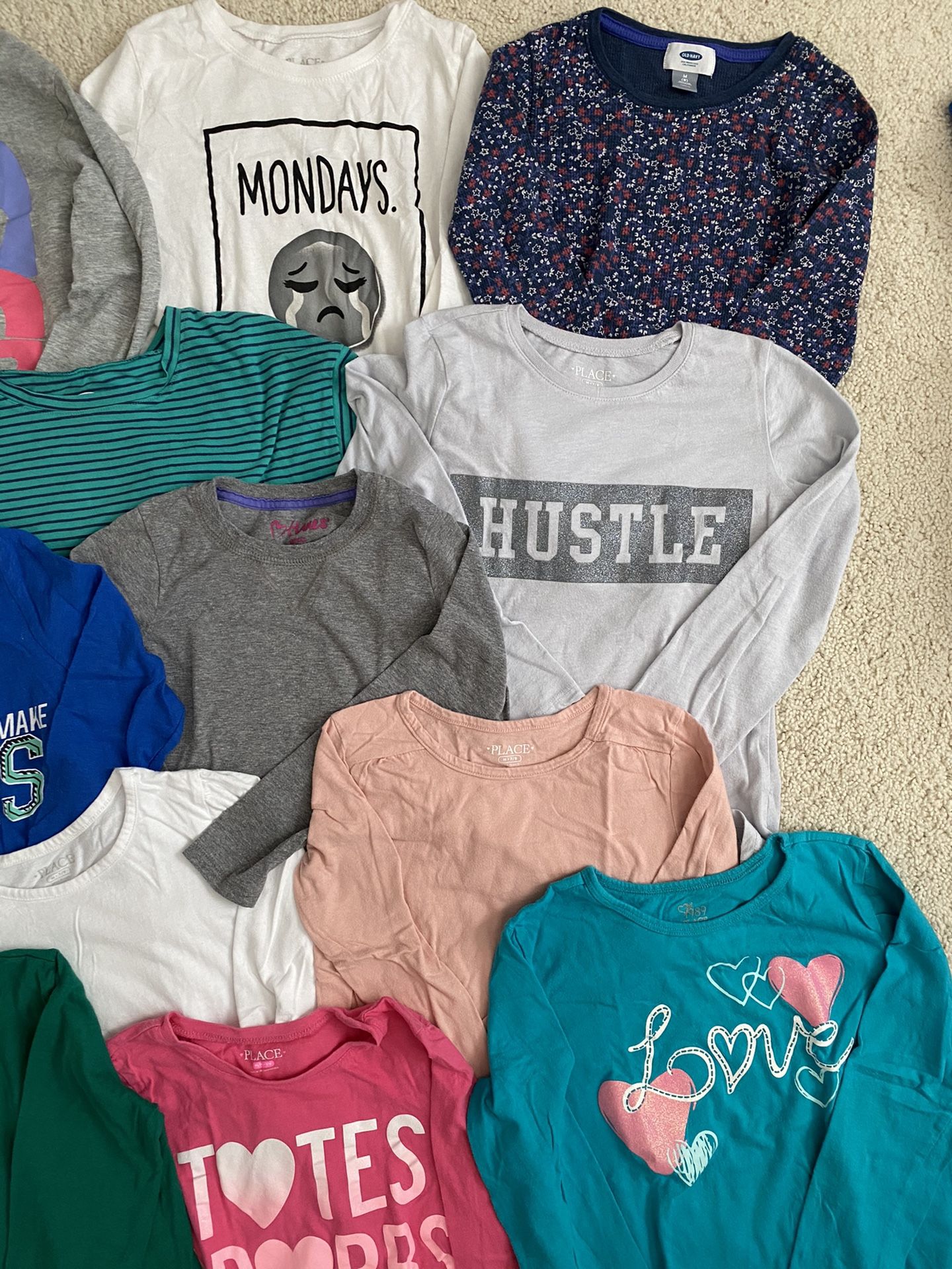 Girls long sleeve shirts, sizes 7-8, $1 each