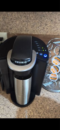 Coffee maker with pods holder
