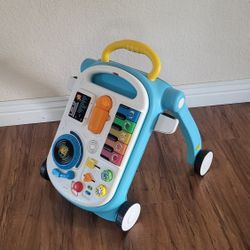 Baby Learning Toy And Walker ( See all pictures).